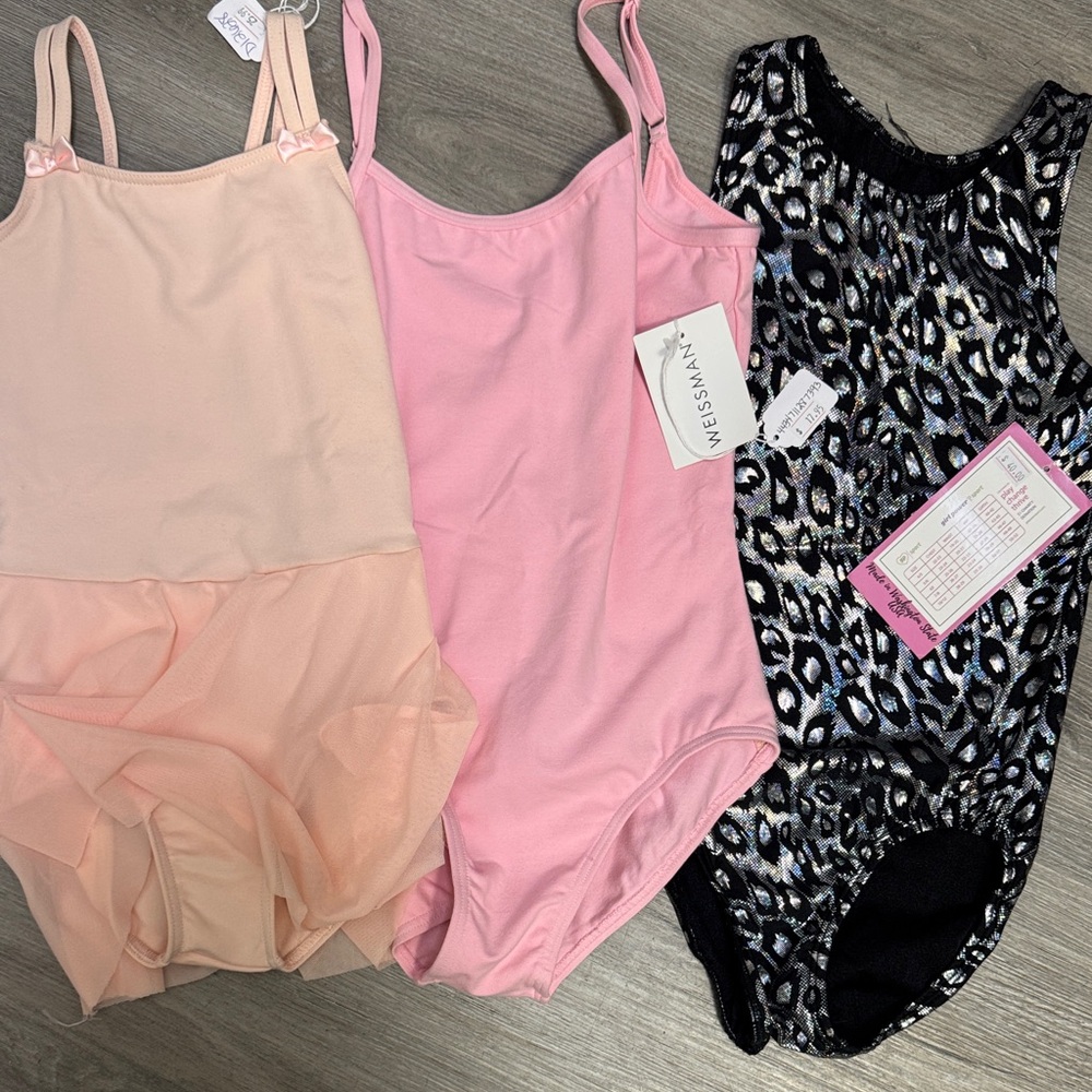 2 Weissman Girls' Leotards. Pink in the middle is sold